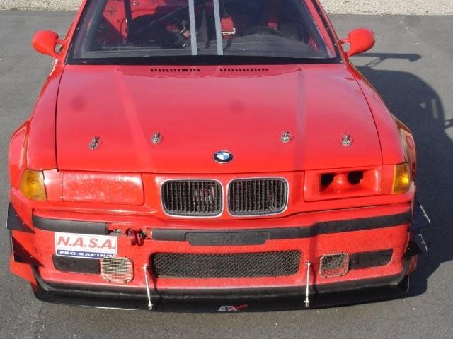 APR PERFORMANCE CARBON FIBRE FRONT WIND SPLITTER W/RODS