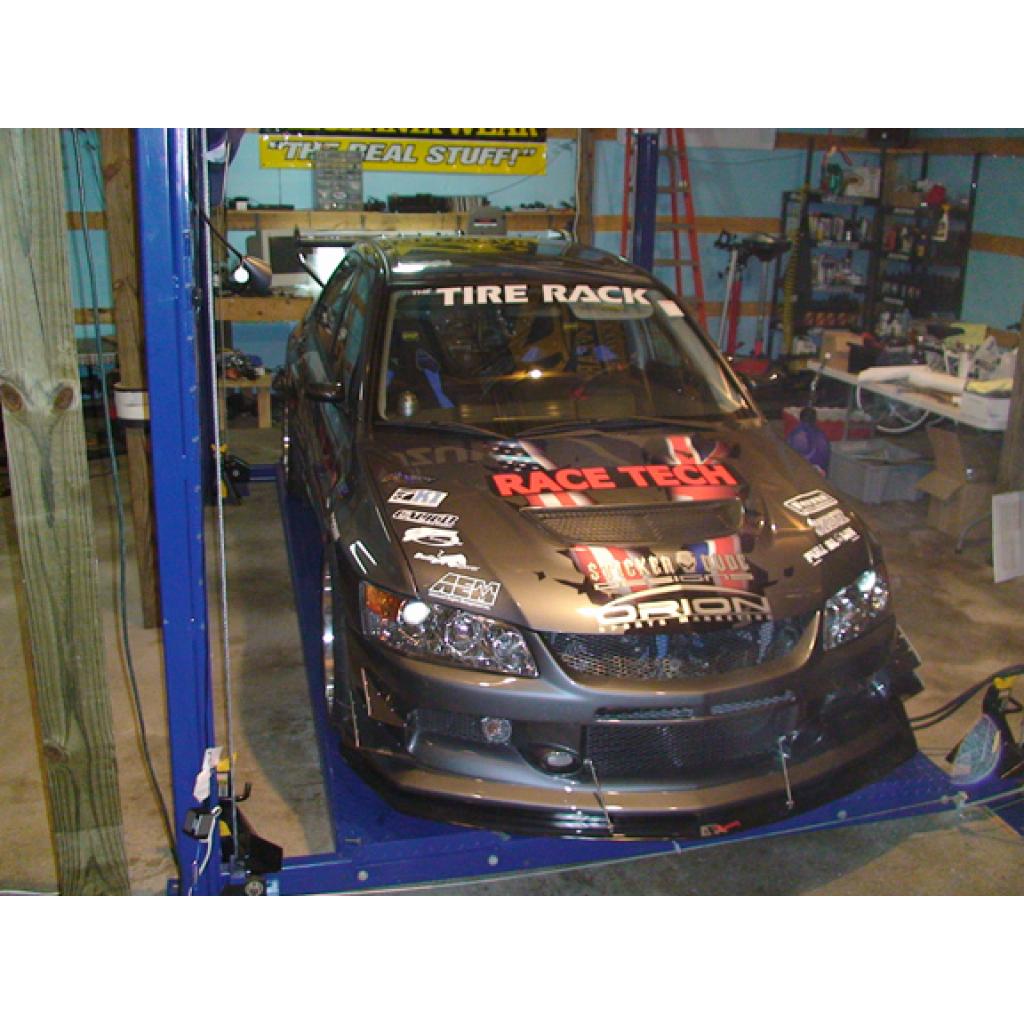 APR PERFORMANCE CARBON FIBRE FRONT WIND SPLITTER W/RODS