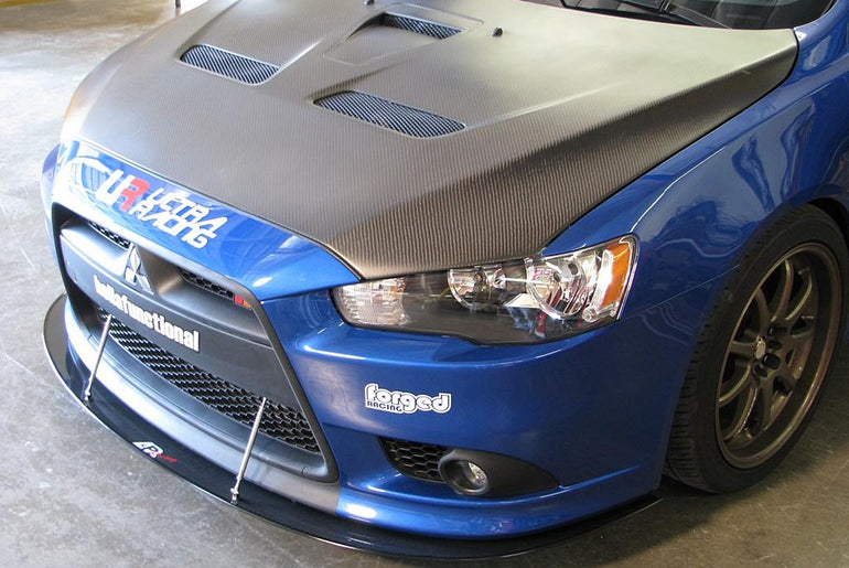 APR PERFORMANCE CARBON FIBRE FRONT WIND SPLITTER W/RODS