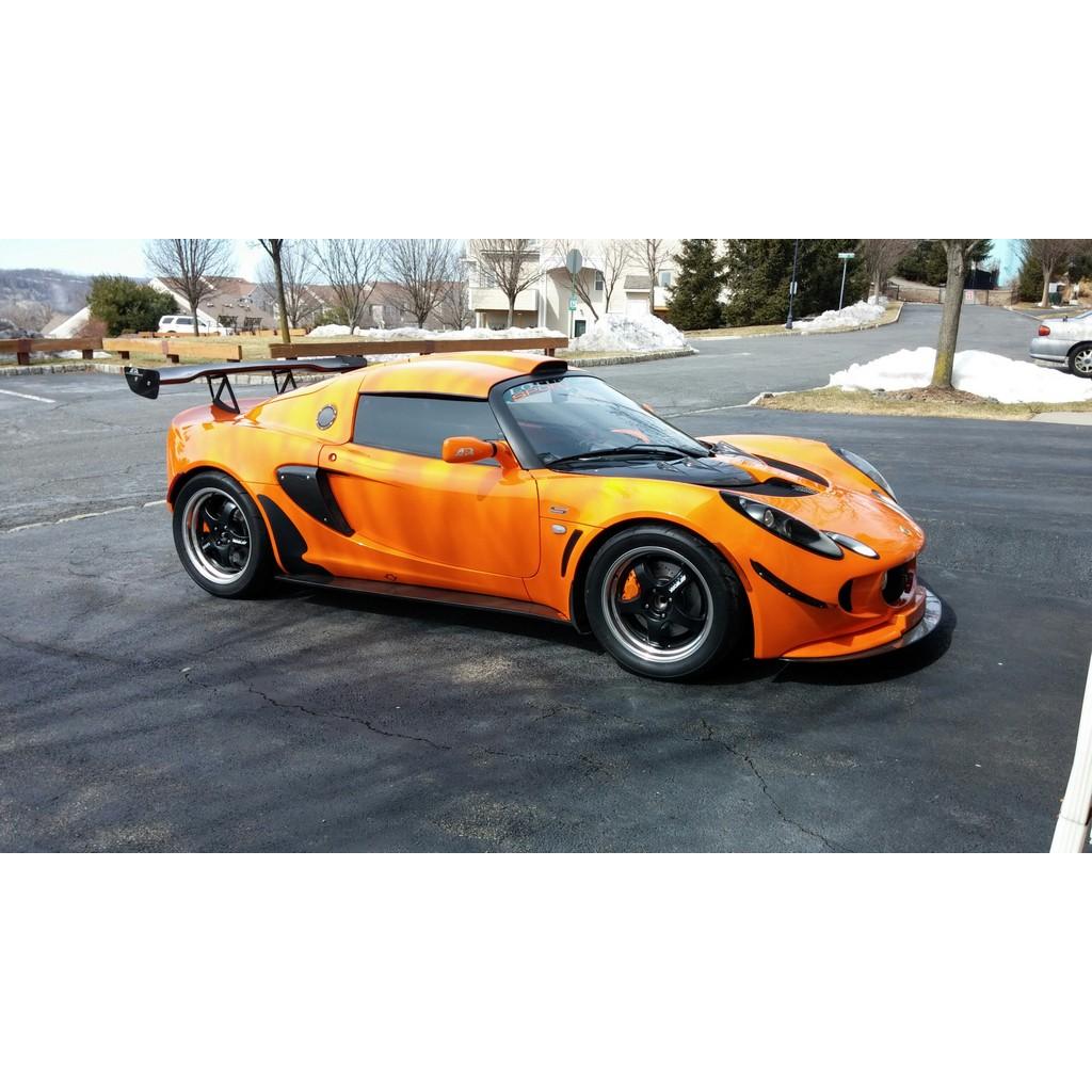 APR PERFORMANCE CARBON FIBRE FRONT WIND SPLITTER W/RODS